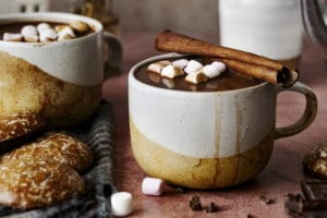 Marshmallows dipped in hot chocolate Christmas food photography