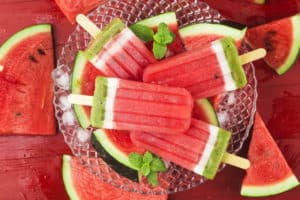 Homemade watermelon popsicles on a plate. Summer food concept