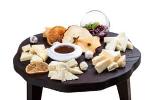 set-different-cheeses-wooden-board-cheese-board_690179-615