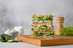 english-tea-sandwiches-with-ricotta-dill-cucumber-gray-background
