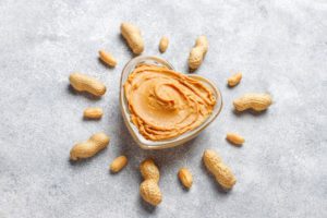 homemade-organic-peanut-butter-with-peanuts_114579-18849