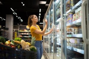 woman-buying-groceries-supermarket